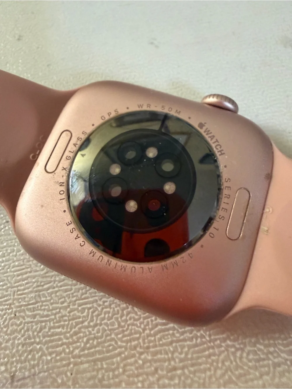 Apple Series 10 Pink Smartwatch with Pink Silicone Band READ